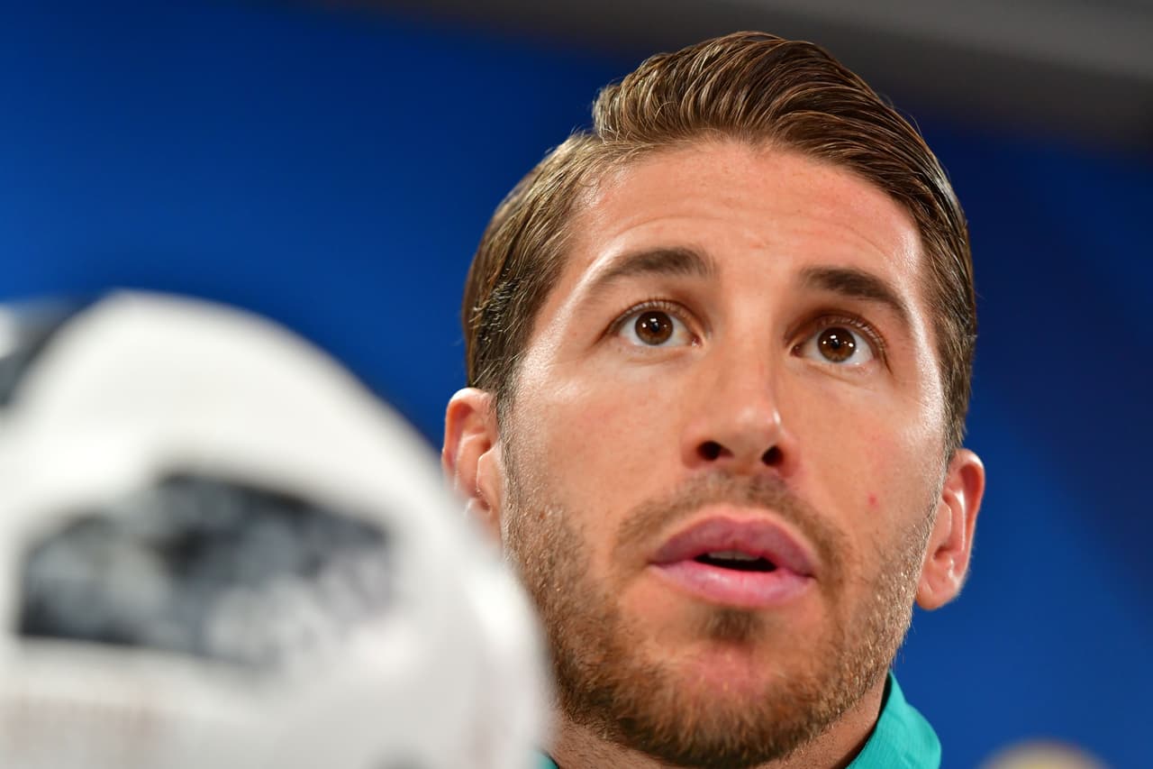 Real Madrid captain and defender Sergio Ramos speaks during a press conference on the eve of their FIFA Club World Cup final match against Brazilian Gremio club in the Emirati capital Abu Dhabi on December 15, 2017. / AFP PHOTO / Giuseppe CACACE (Photo credit should read GIUSEPPE CACACE/AFP/Getty Images)