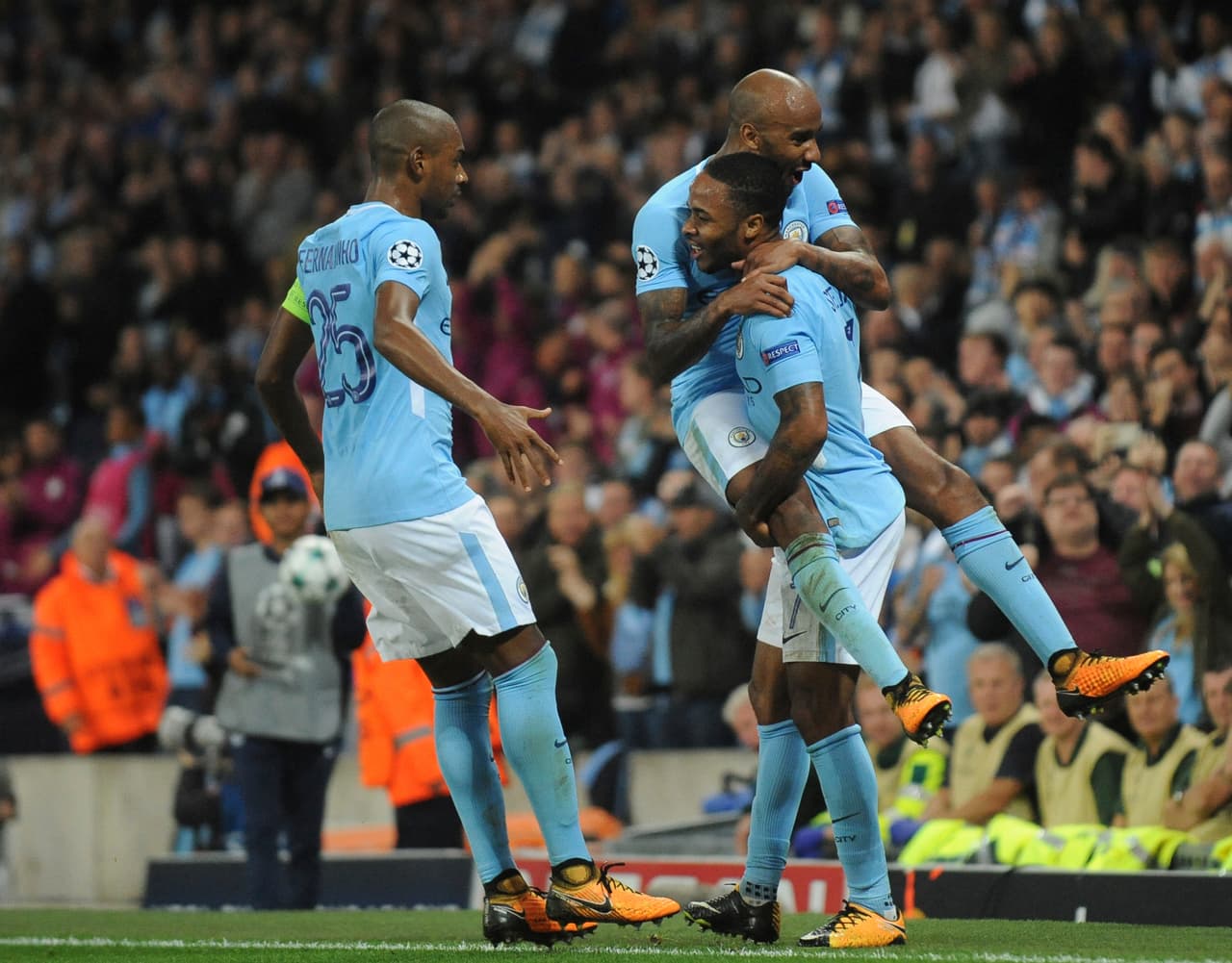 Manchester City's Raheem Sterling celebrates with teammates after scoring his sides second goal of the game during the Champions League Group F soccer match between Manchester City and Shakhtar Donetsk at Etihad stadium, Manchester, England, Tuesday, Sept. 26, 2017.City won the game 2-0. (AP Photo/Rui Vieira)