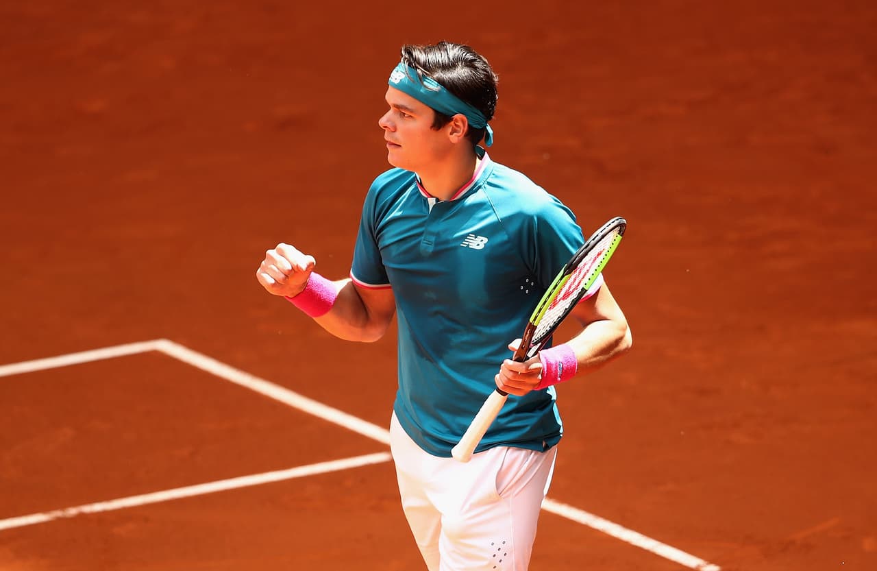 MADRID, SPAIN - MAY 10: Milos Raonic of Canada celebrates defeating Gilles Muller of Luxembourg during day five of the Mutua Madrid Open tennis at La Caja Magica on May 10, 2017 in Madrid, Spain. (Photo by Julian Finney/Getty Images)