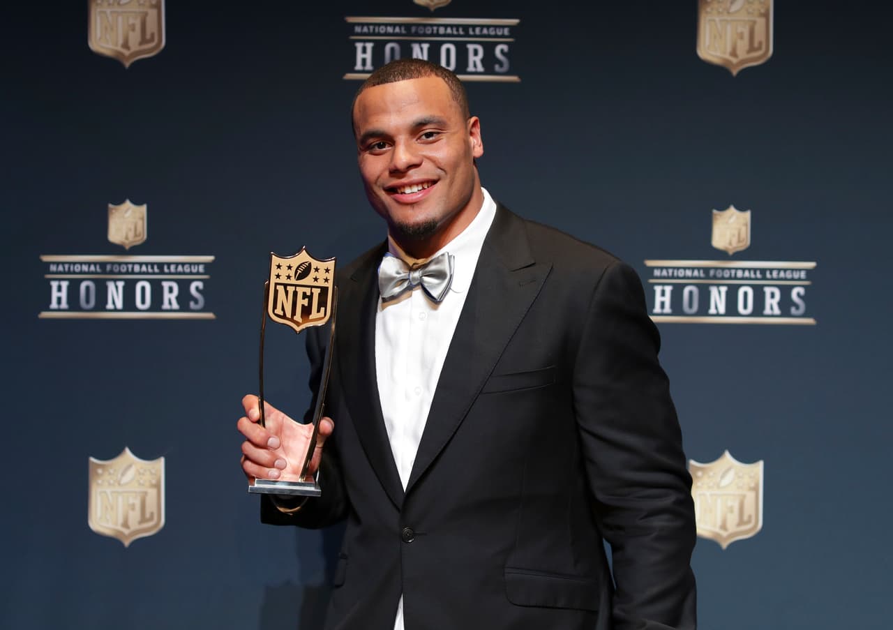 Dak Prescott of the Dallas Cowboys poses in the press room with the AP Offensive Player of the Year award presented by Microsoft at the 6th annual NFL Honors at the Wortham Center on Saturday, Feb. 4, 2017, in Houston. (Photo by Jeff Lewis/Invision for NFL/AP Images)
