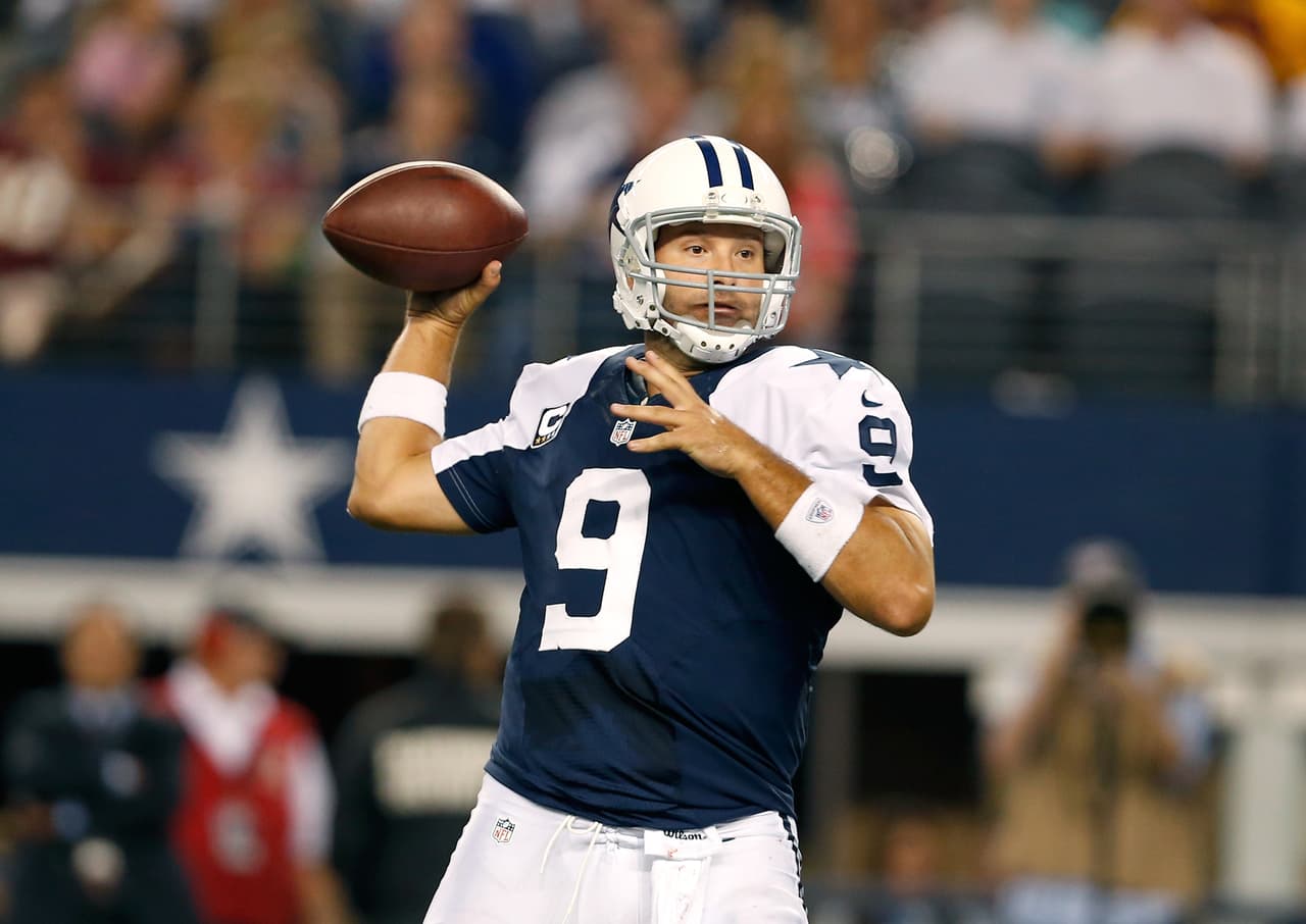 Dallas Cowboys quarterback Tony Romo (9) throws a pass during an NFL football game against the Washington Redskins at Cowboys Stadium on Thursday November 22, 2012 in Arlington, Texas. Washington won 38-31. (AP Photo/Aaron M. Sprecher)