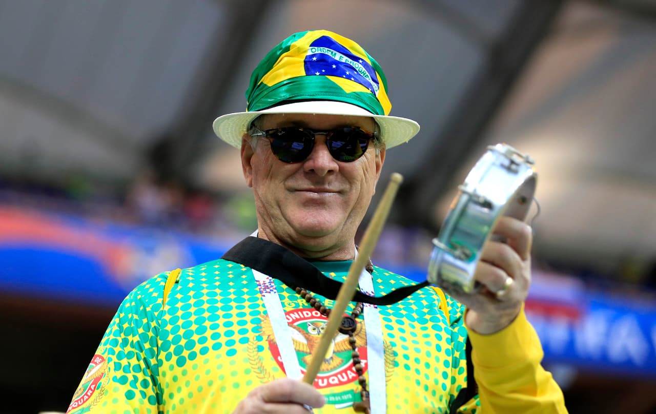 ROSTOV-ON-DON, RUSSIA - JUNE 17: A Brazil fan enjoys the pre match atmosphere prior to the 2018 FIFA World Cup Russia group E match between Brazil and Switzerland at Rostov Arena on June 17, 2018 in Rostov-on-Don, Russia. (Photo by Buda Mendes/Getty Images)