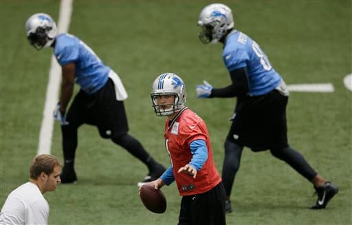 La ofensiva de los Lions dirigida por Stafford (AP-NFL).
