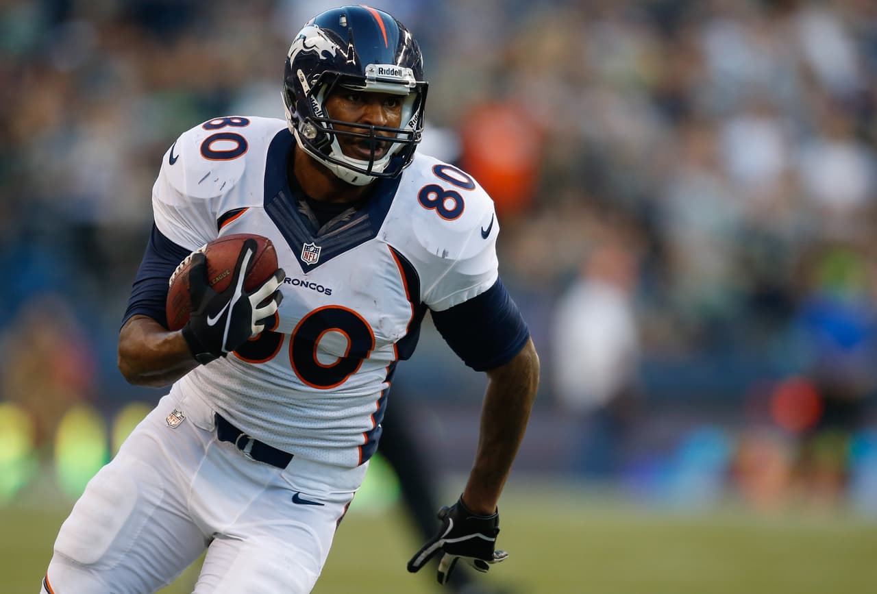 SEATTLE, WA - AUGUST 17: Tight end Julius Thomas #80 of the Denver Broncos rushes against the Seattle Seahawks at CenturyLink Field on August 17, 2013 in Seattle, Washington. (Photo by Otto Greule Jr/Getty Images)