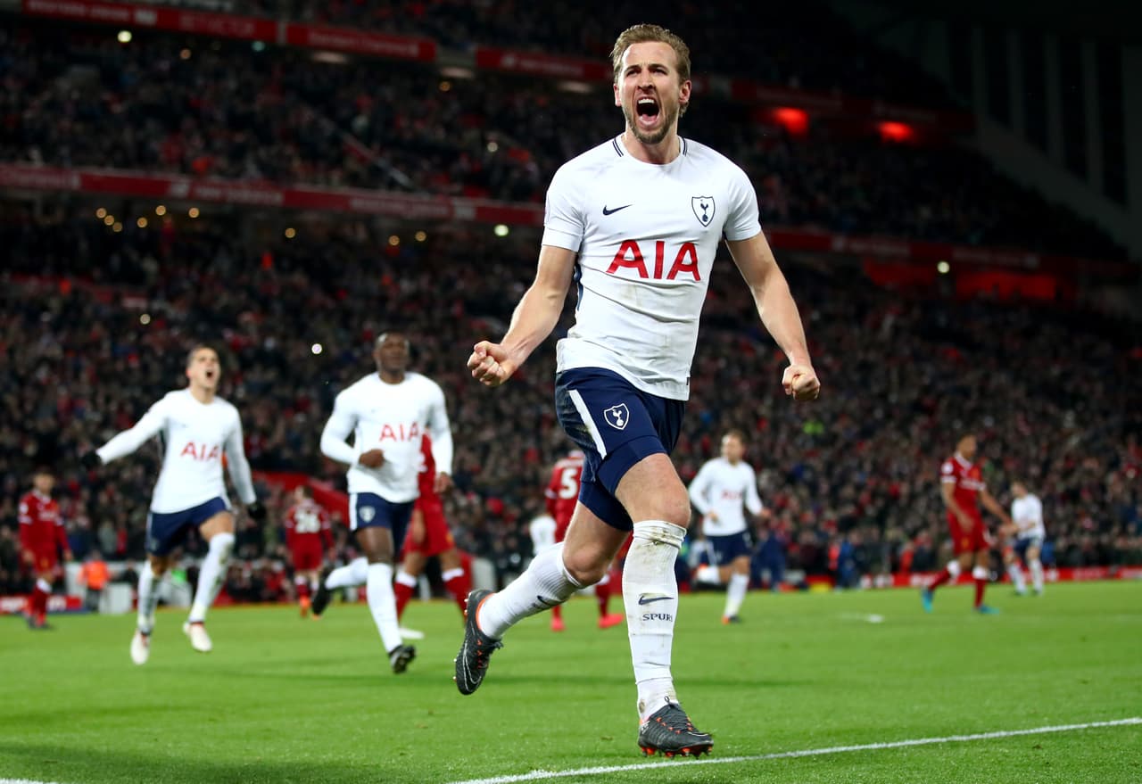 LIVERPOOL, ENGLAND - FEBRUARY 04: Harry Kane of Tottenham Hotspur celebrates after scoring his sides second goal and his 100th Premier League goal during the Premier League match between Liverpool and Tottenham Hotspur at Anfield on February 4, 2018 in Liverpool, England. (Photo by Clive Brunskill/Getty Images)