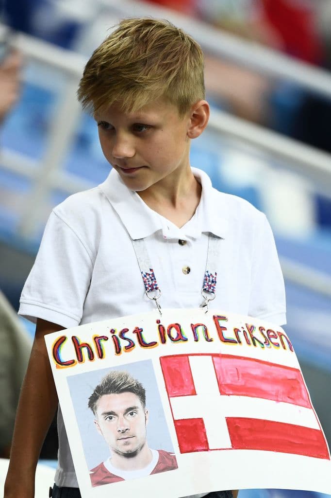 A Denmark fan wears a sign for Denmark's midfielder Christian Eriksen before the Russia 2018 World Cup round of 16 football match between Croatia and Denmark at the Nizhny Novgorod Stadium in Nizhny Novgorod on July 1, 2018. (Photo by Jewel SAMAD / AFP) / RESTRICTED TO EDITORIAL USE - NO MOBILE PUSH ALERTS/DOWNLOADS (Photo credit should read JEWEL SAMAD/AFP/Getty Images)