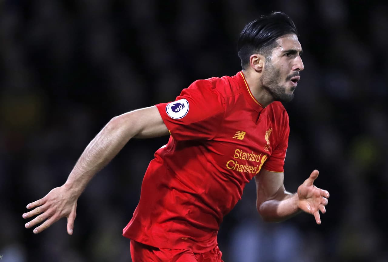 Liverpool's German midfielder Emre Can celebrates after scoring the opening goal of the English Premier League football match between Watford and Liverpool at Vicarage Road Stadium in Watford, north of London on May 1, 2017. / AFP PHOTO / Adrian DENNIS / RESTRICTED TO EDITORIAL USE. No use with unauthorized audio, video, data, fixture lists, club/league logos or 'live' services. Online in-match use limited to 75 images, no video emulation. No use in betting, games or single club/league/player publications. / (Photo credit should read ADRIAN DENNIS/AFP/Getty Images)