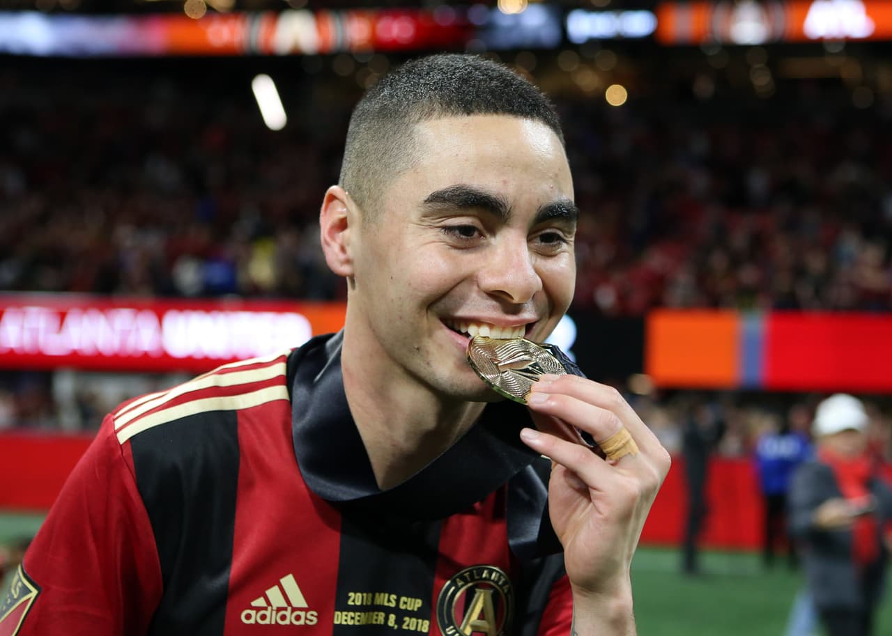 Dec 8, 2018; Atlanta, GA, USA; Atlanta United midfielder Miguel Almiron (10) celebrates after defeating the Portland Timbers in the 2018 MLS Cup championship game at Mercedes-Benz Stadium. Mandatory Credit: Brett Davis-USA TODAY Sports