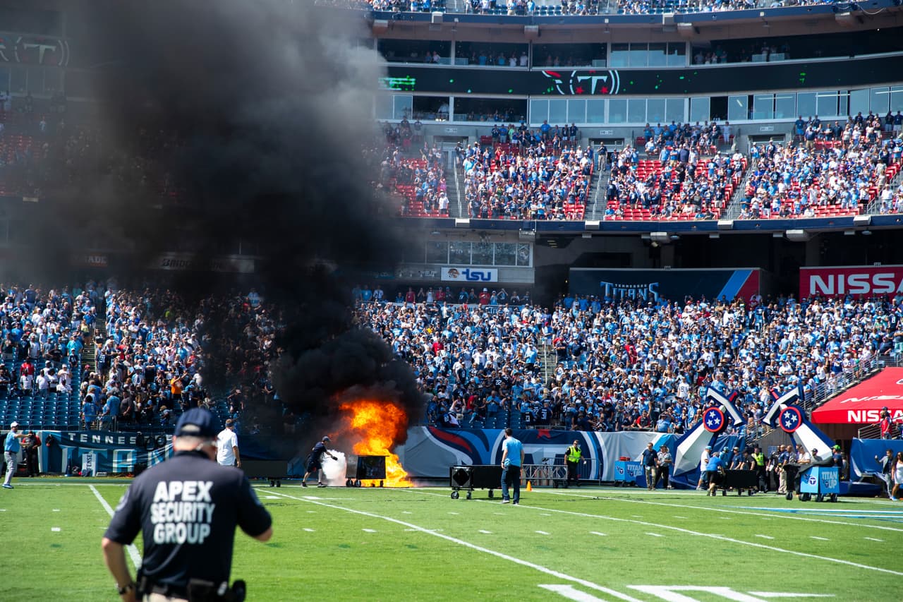 NASHVILLE, TN - SEPTEMBER 15: A failed pyrotechnic device bursts into flames before the game between the Tennessee Titans and the Indianapolis Colts at Nissan Stadium on September 15, 2019 in Nashville, Tennessee. (Photo by Brett Carlsen/Getty Images)