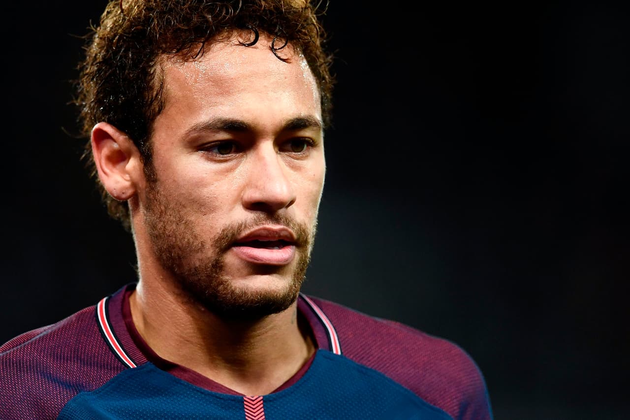 Paris Saint-Germain's Brazilian forward Neymar reacts during the French L1 football match between Paris Saint-Germain (PSG) and Troyes at the Parc des Princes stadium in Paris on November 29, 2017. / AFP PHOTO / CHRISTOPHE SIMON (Photo credit should read CHRISTOPHE SIMON/AFP/Getty Images)