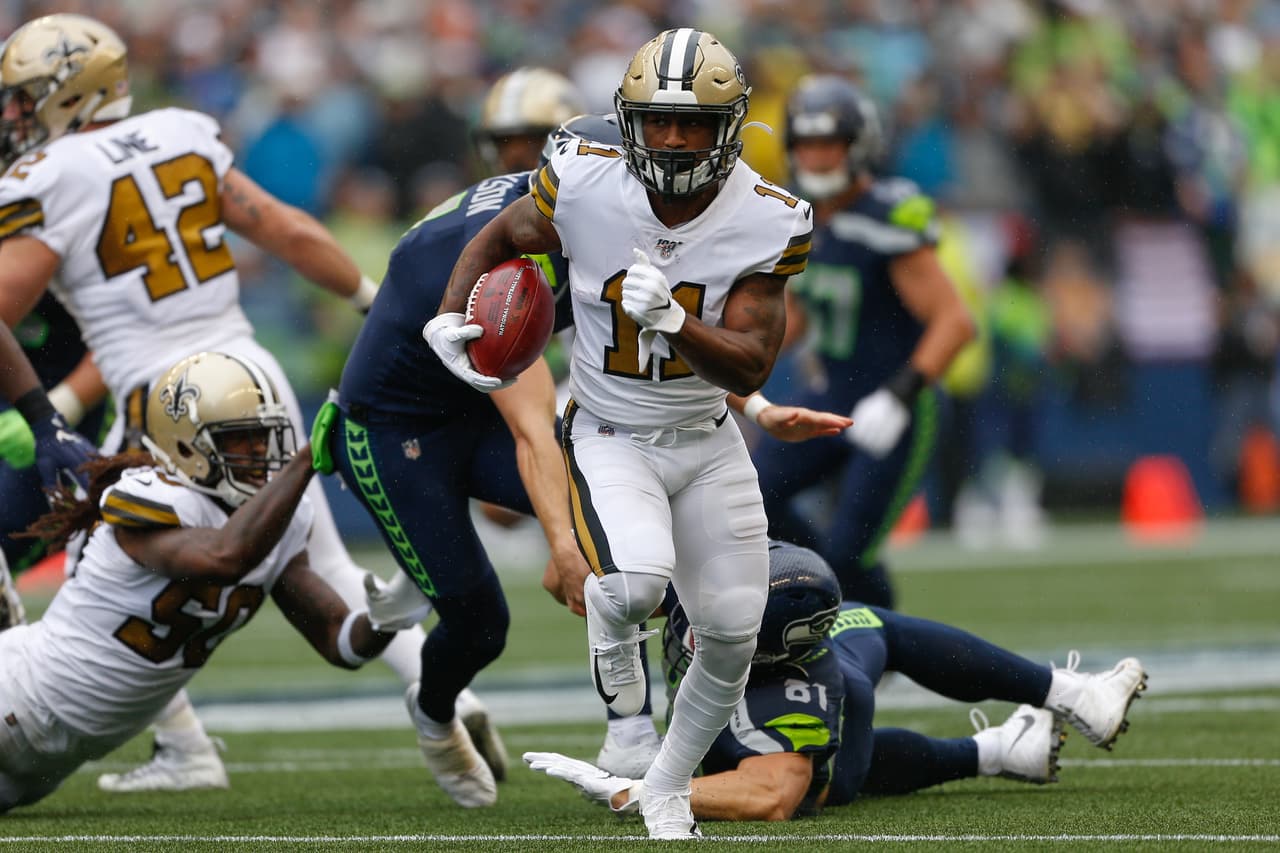 <b>New Orleans Saints 33-27 Seattle Seahawks.</b> Deonte Harris corre para lograr un touchdown, en el primer cuarto, para los Saints.
