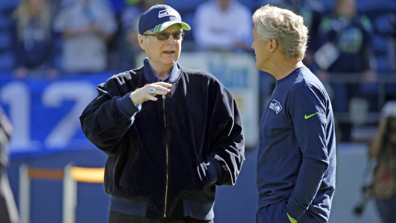Paul Allen (izq.) junto al coach de los Seahawks, Pete Carroll.