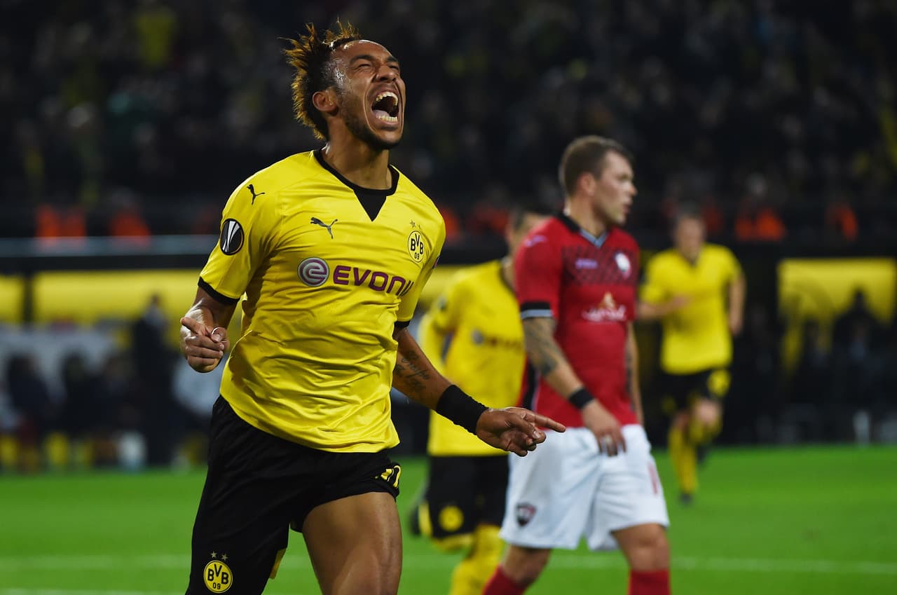 ¿Aubameyang con los días contados con el Dortmund? El atacante africano es pretendido por el Arsenal, quien ya realizó una oferta de 60 millones de euros a cambio del delantero gabonés. El Borussia Dortmund comentó que no piensa vender al delantero aunque les ofrezcan 100 millones, falta ver si llega una oferta así para rechazarla.