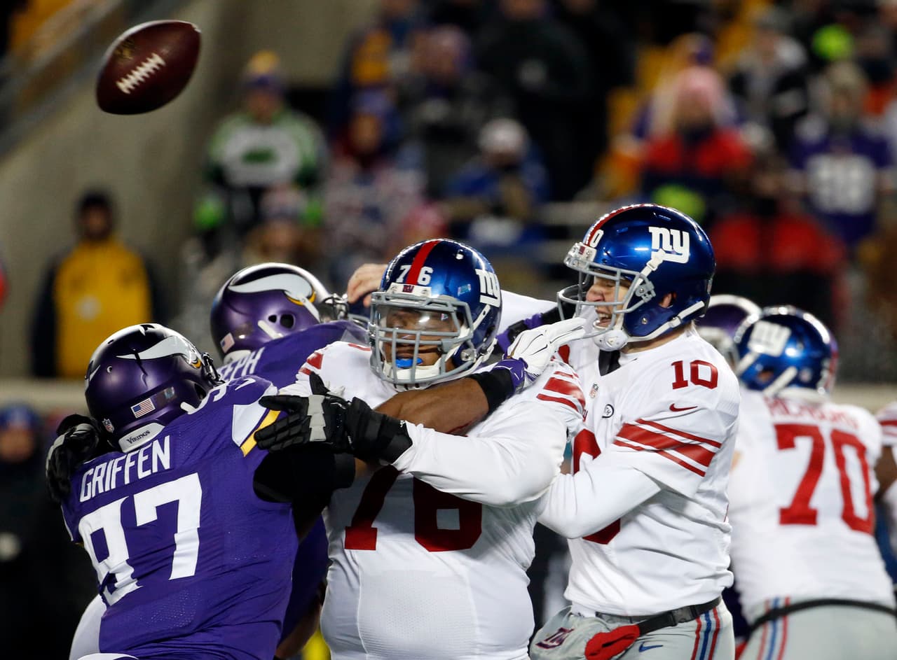 Los Vikings regresaron a los Playoffs desde el 2012 gracias a su victoria vs. Giants 49-17. Aquí las mejores tomas.