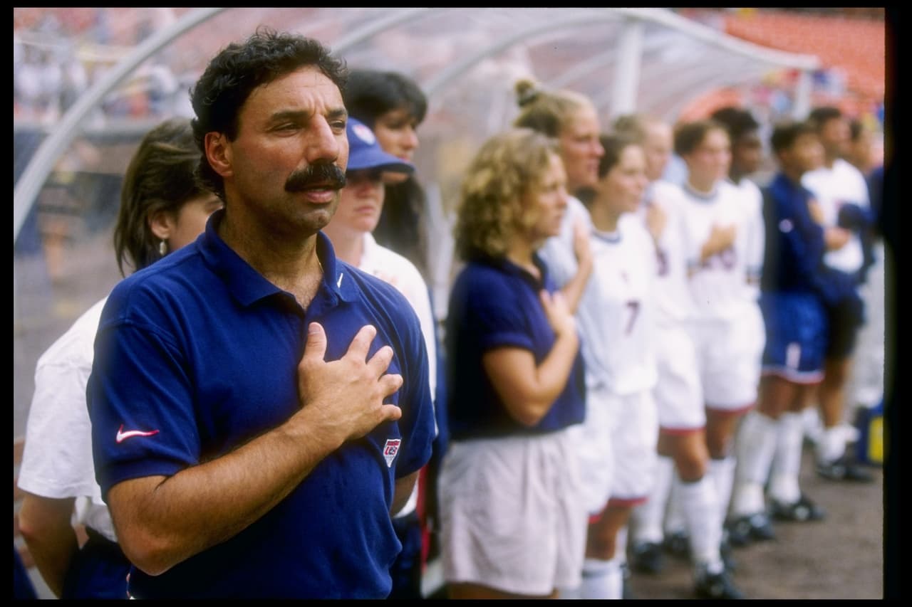 6 Aug 1995: Tony DiCicco of the USA holds his hand over his heart before a game against Norway at RFK Stadium in Washington, D.C. The USA won the game 2-1. Mandatory Credit: Rick Stewart /Allsport