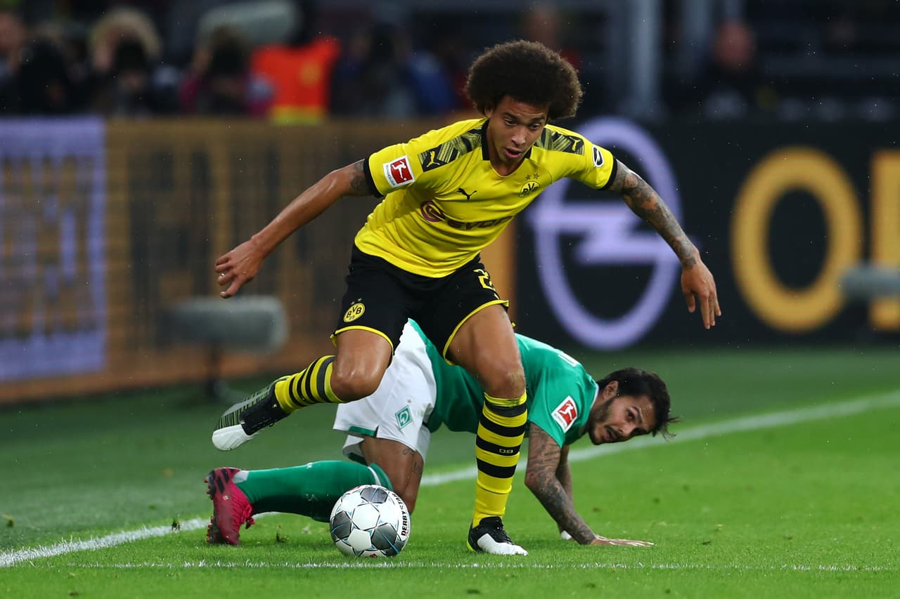 Con goles de Mario G¨otze al minuto 9 y de Marco Reus el Borussia Dotrmund empató en casa con el Werder Bremen.