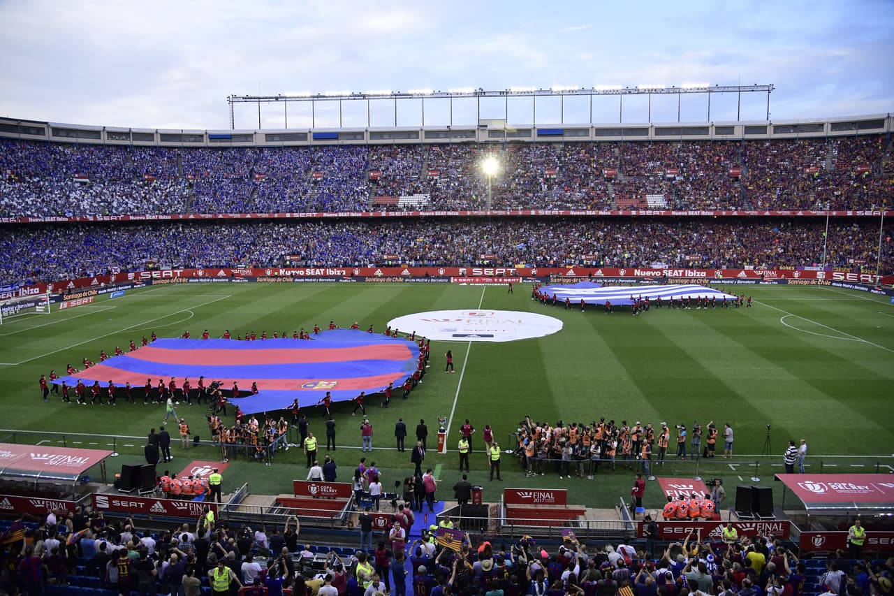 Two giant jerseys of both teams are displayed on the pitch before the Spanish Copa del Rey (King's Cup) final football match FC Barcelona vs Deportivo Alaves at the Vicente Calderon stadium in Madrid on May 27, 2017. / AFP PHOTO / JAVIER SORIANO (Photo credit should read JAVIER SORIANO/AFP/Getty Images)