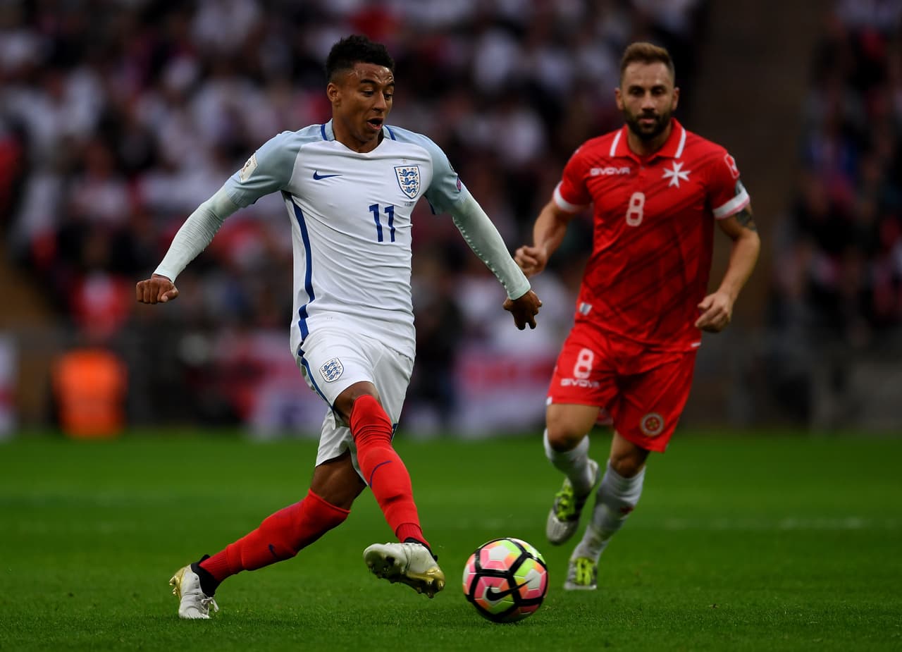 LONDON, ENGLAND - OCTOBER 08: Jesse Lingard of England passes ahead of Paul Fenech of Malta during the FIFA 2018 World Cup Qualifier Group F match between England and Malta at Wembley Stadium on October 8, 2016 in London, England. (Photo by Mike Hewitt/Getty Images)