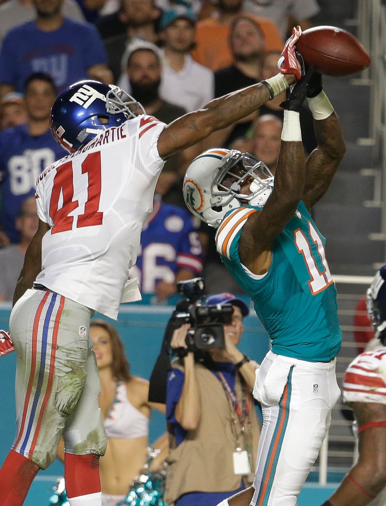Valiosa victoria para los Giants sobre los Dolphins 31-24, para empatar en la cima de la loca NFC Este.