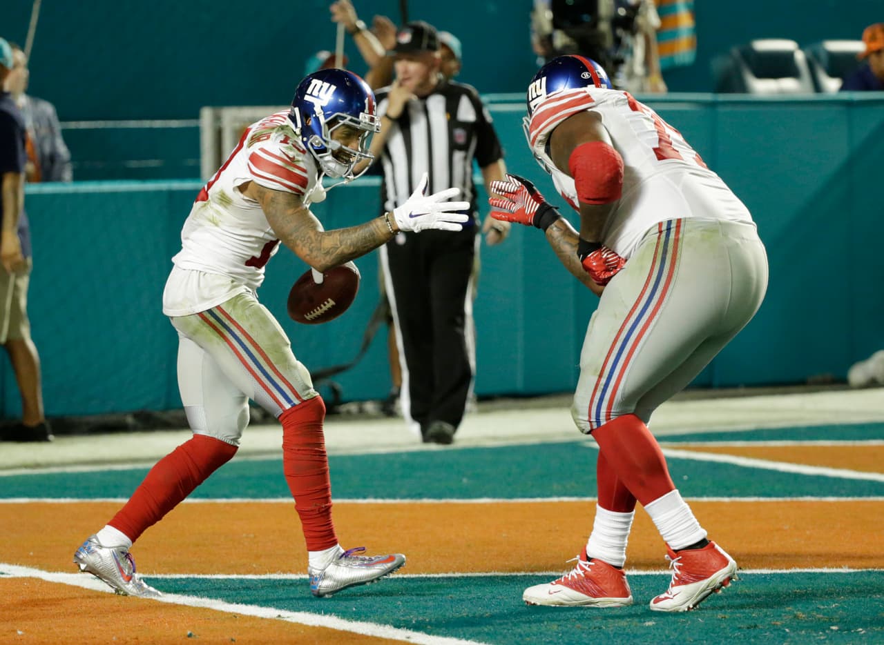 Valiosa victoria para los Giants sobre los Dolphins 31-24, para empatar en la cima de la loca NFC Este.
