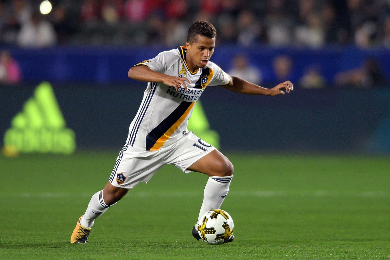 Sep 30, 2017; Carson, CA, USA; Los Angeles Galaxy forward Giovani dos Santos (10) moves the ball during the first half against the Real Salt Lake at StubHub Center. Mandatory Credit: Orlando Ramirez-USA TODAY Sports