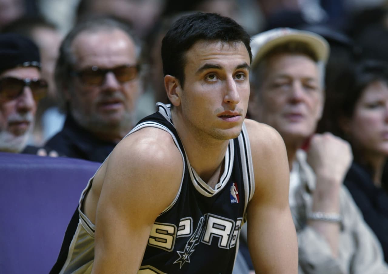 Ginobili fue seleccionado en el Draft en 1999 por San Antonio Spurs, pero jugó su primer partido de NBA el 29 de octubre de 2002 contra Los Angeles Lakers, frente a los ojos del propio Jack Nicholson.
