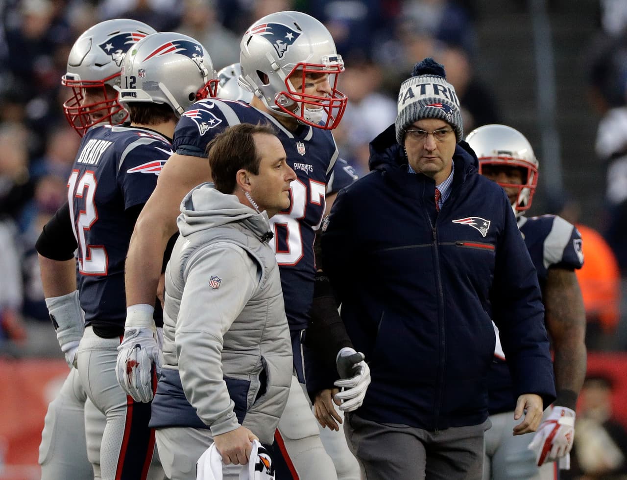 New England Patriots tight end Rob Gronkowski, center, is assisted from the field after a hit by Jacksonville Jaguars safety Barry Church during the first half of the AFC championship NFL football game, Sunday, Jan. 21, 2018, in Foxborough, Mass. (AP Photo/David J. Phillip)