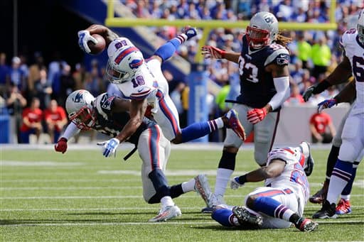 Los Buffalo Bills no pudieron contender a la poderosa ofensiva de los New England Patriots y perdieron en casa 40-32. Checa las mejores imágenes de este duelo.