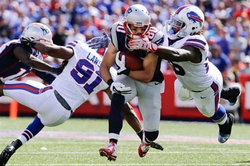 Los Buffalo Bills no pudieron contender a la poderosa ofensiva de los New England Patriots y perdieron en casa 40-32. Checa las mejores imágenes de este duelo.