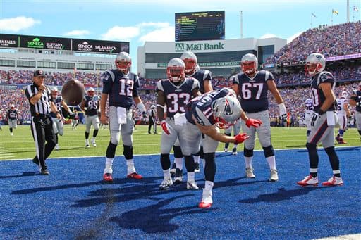 Los Buffalo Bills no pudieron contender a la poderosa ofensiva de los New England Patriots y perdieron en casa 40-32. Checa las mejores imágenes de este duelo.