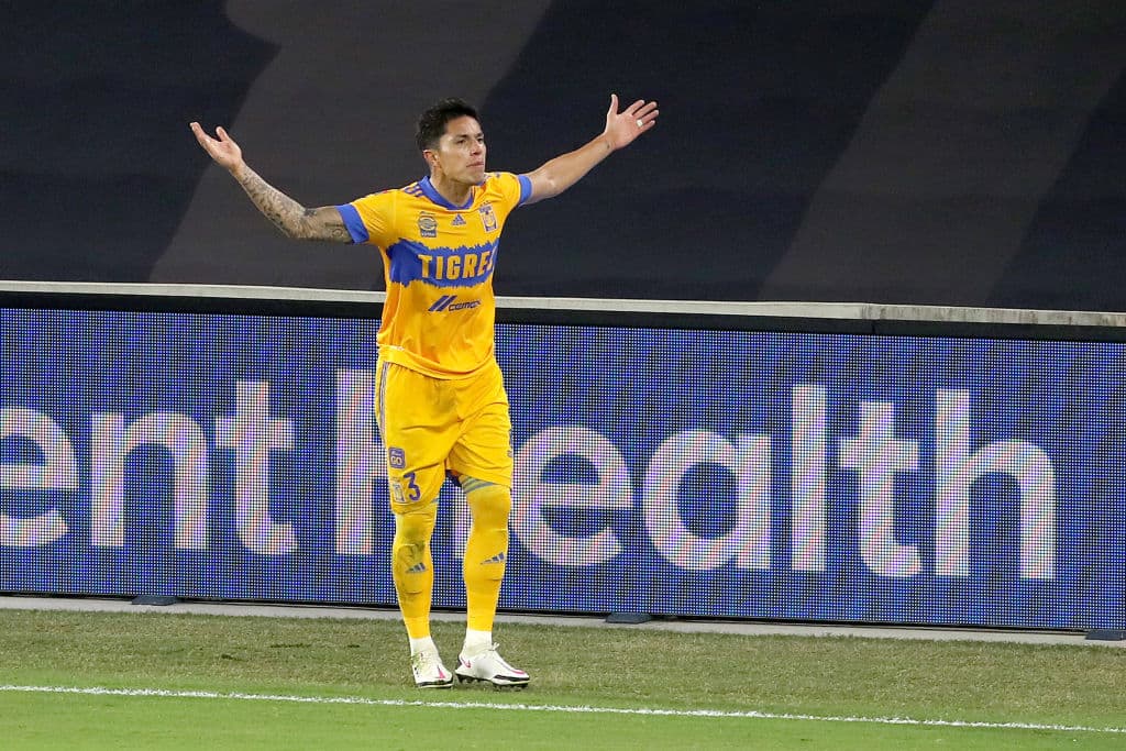 ORLANDO, FL - DECEMBER 19: Carlos Salcedo #3 of Tigres UANL reacts to a non-call during the CONCACAF Champions League semifinal game against CD Olimpia at Exploria Stadium on December 19, 2020 in Orlando, Florida. (Photo by Alex Menendez/Getty Images)