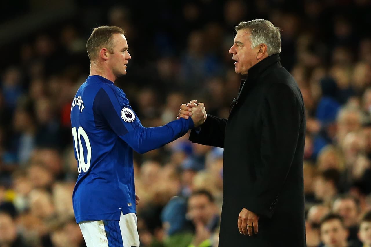 LIVERPOOL, ENGLAND - DECEMBER 02: Wayne Rooney of Everton and Sam Allardyce, Manager of Everton shake hands during the Premier League match between Everton and Huddersfield Town at Goodison Park on December 2, 2017 in Liverpool, England. (Photo by Jan Kruger/Getty Images)