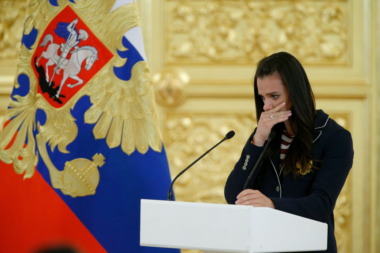 Russia's pole vaulter Yelena Isinbayeva reacts as she speaks during President Putin's reception for members of the country's Olympic team at the Kremlin in Moscow on July 27, 2016. President Vladimir Putin said on July 27 the absence of top Russian competitors will "markedly lower" next month's Rio Games, as he met competitors set for Brazil and those barred over state-run doping. / AFP / POOL / Alexander Zemlianichenko (Photo credit should read ALEXANDER ZEMLIANICHENKO/AFP/Getty Images)