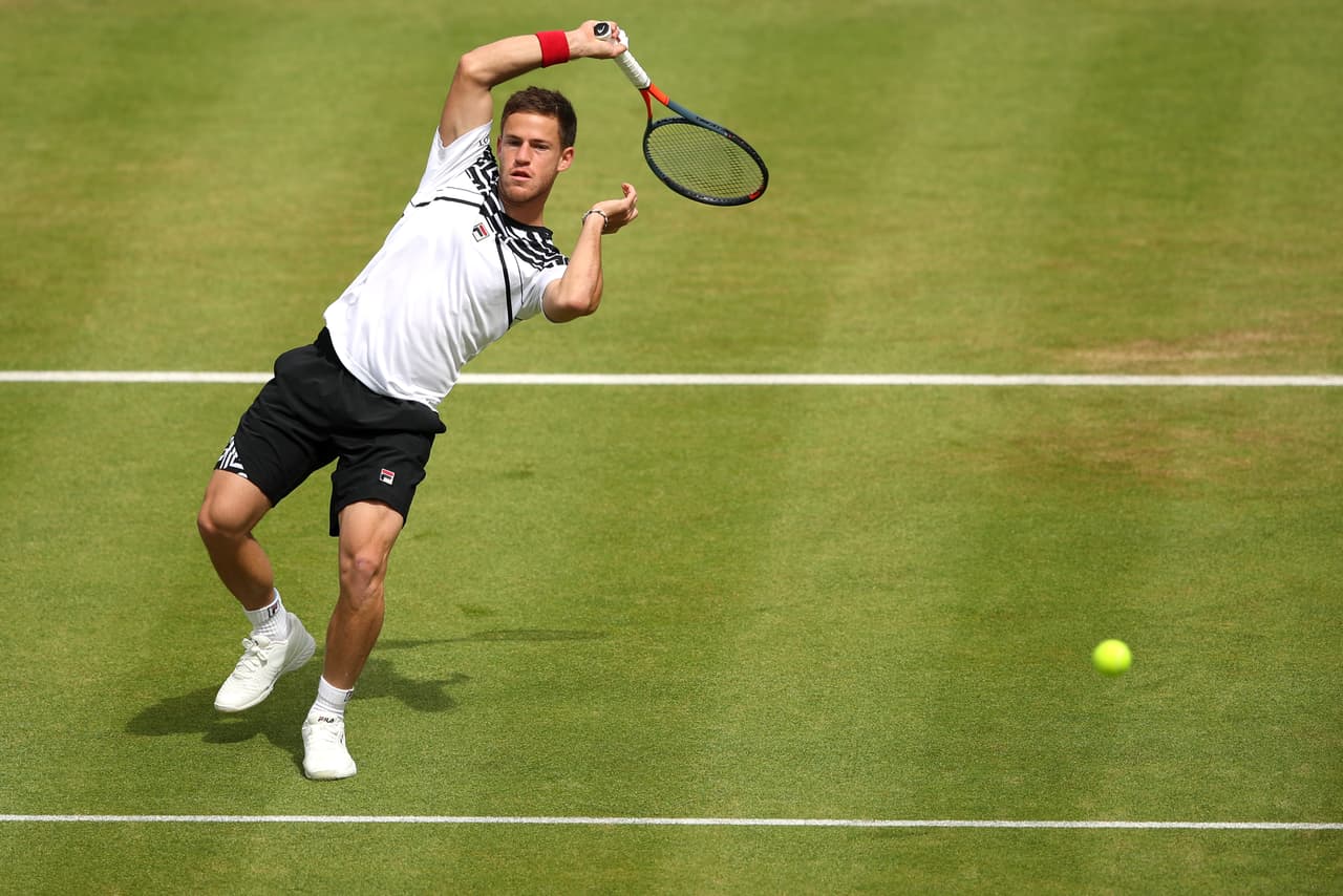 LONDON, ENGLAND - JUNE 20: Diego Schwartzman of Argentina serves during his Second Round Singles Match against Marin Cilic of Croatia during day Four of the Fever-Tree Championships at Queens Club on June 20, 2019 in London, United Kingdom. (Photo by Alex Pantling/Getty Images)