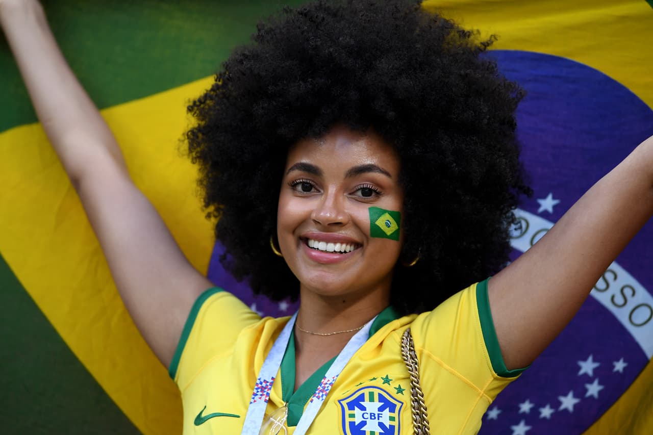 KAZAN, RUSSIA - JULY 06: A Brazil fan enjoys the pre match atmosphere prior to the 2018 FIFA World Cup Russia Quarter Final match between Brazil and Belgium at Kazan Arena on July 6, 2018 in Kazan, Russia. (Photo by Laurence Griffiths/Getty Images)