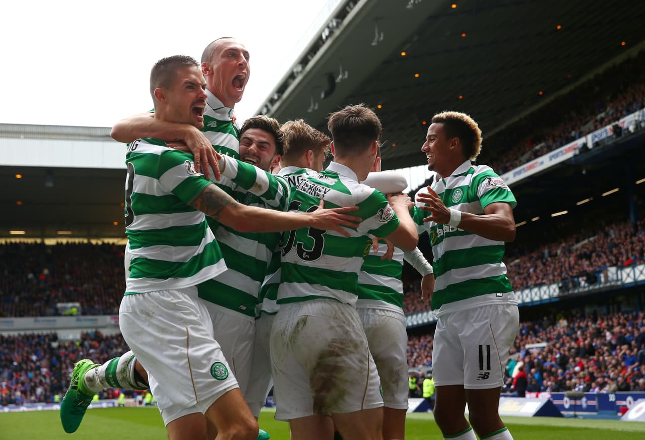 GLASGOW, SCOTLAND - APRIL 29: Mikael Lustig (L) and Scott Brown (2ndL) of Celtic celebrate their team's third goal scored by Callum McGregor during the Ladbrokes Scottish Premiership match between Rangers and Celtic at Ibrox Stadium on April 29, 2017 in Glasgow, Scotland. (Photo by Michael Steele/Getty Images)