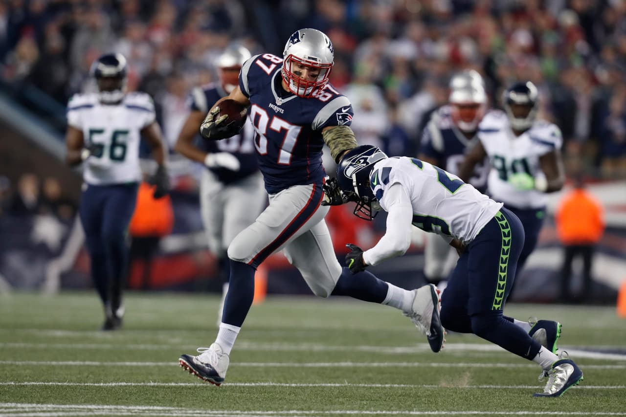 New England Patriots tight end Rob Gronkowski (87) runs from Seattle Seahawks free safety Earl Thomas (29) during an NFL football game, Sunday, Nov. 13, 2016, in Foxborough, Mass. The Seahawks defeated the Patriots, 31-24. (Ryan Kang via AP)