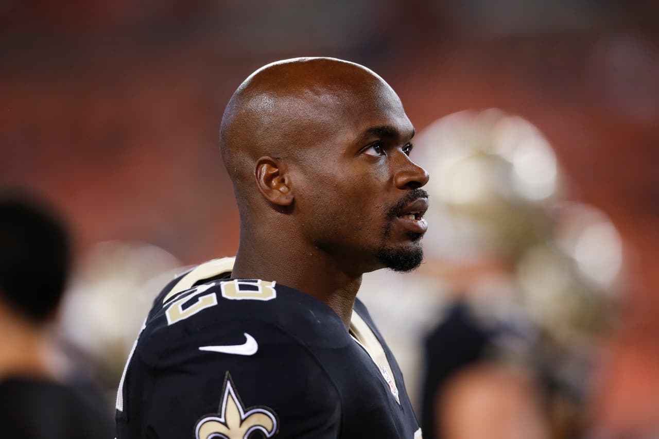 New Orleans Saints running back Adrian Peterson watches during the second half of an NFL preseason football game against the Cleveland Browns, Thursday, Aug. 10, 2017, in Cleveland. (AP Photo/Ron Schwane)