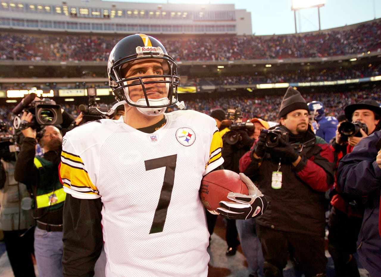 EAST RUTHERFORD, NJ - DECEMBER 18: Ben Roethlisberger #7 of the Pittsburgh Steelers holds the game ball after beating the New York Giants at Giants Stadium on December 18, 2004 in East Rutherford, New Jersey. The Steelers won 33-30. (Photo by Ezra Shaw/Getty Images)