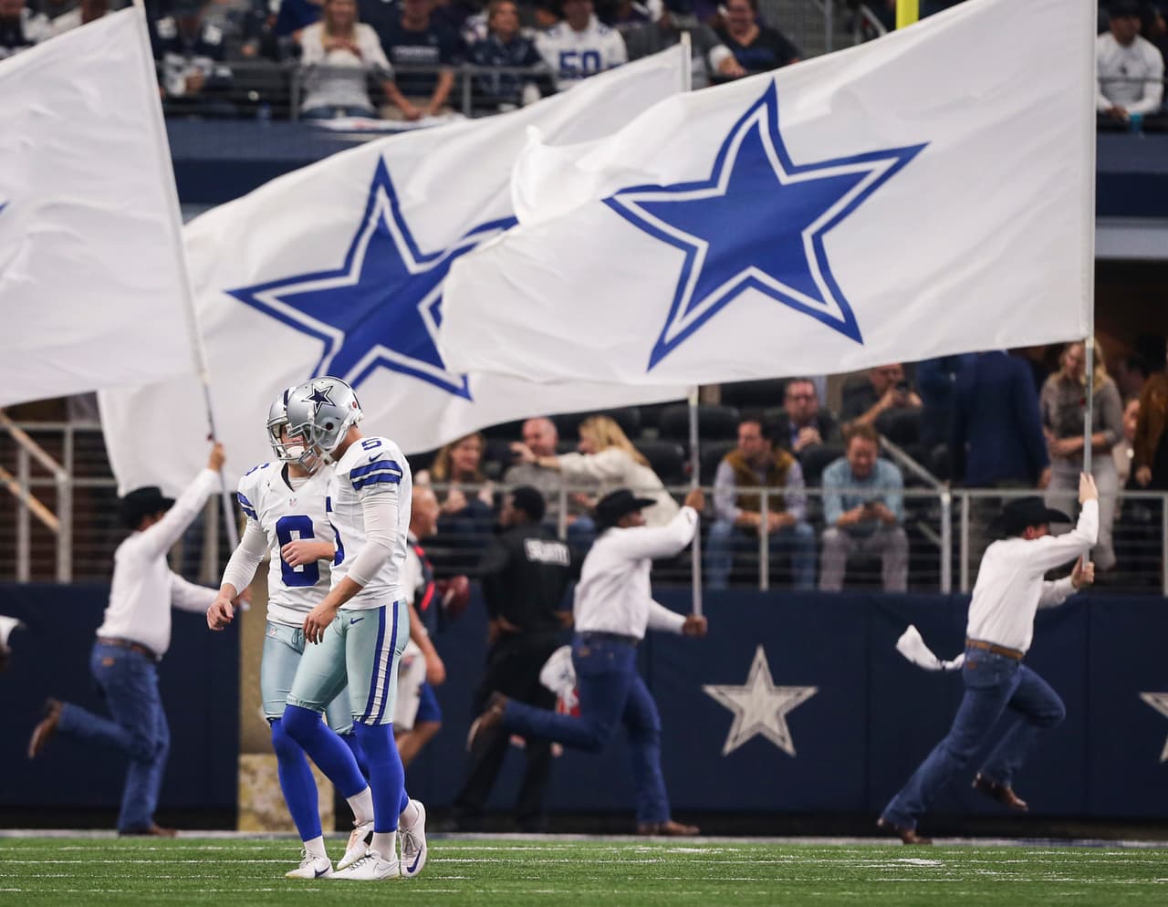 Dallas Cowboys punter Chris Jones (6) and kicker Dan Bailey (5) walk off the field after an extra point kick in the third quarter on Sunday, Nov. 20, 2016 at AT&T Stadium in Arlington, Texas. (Richard W. Rodriguez/Fort Worth Star-Telegram/TNS via Getty Images)