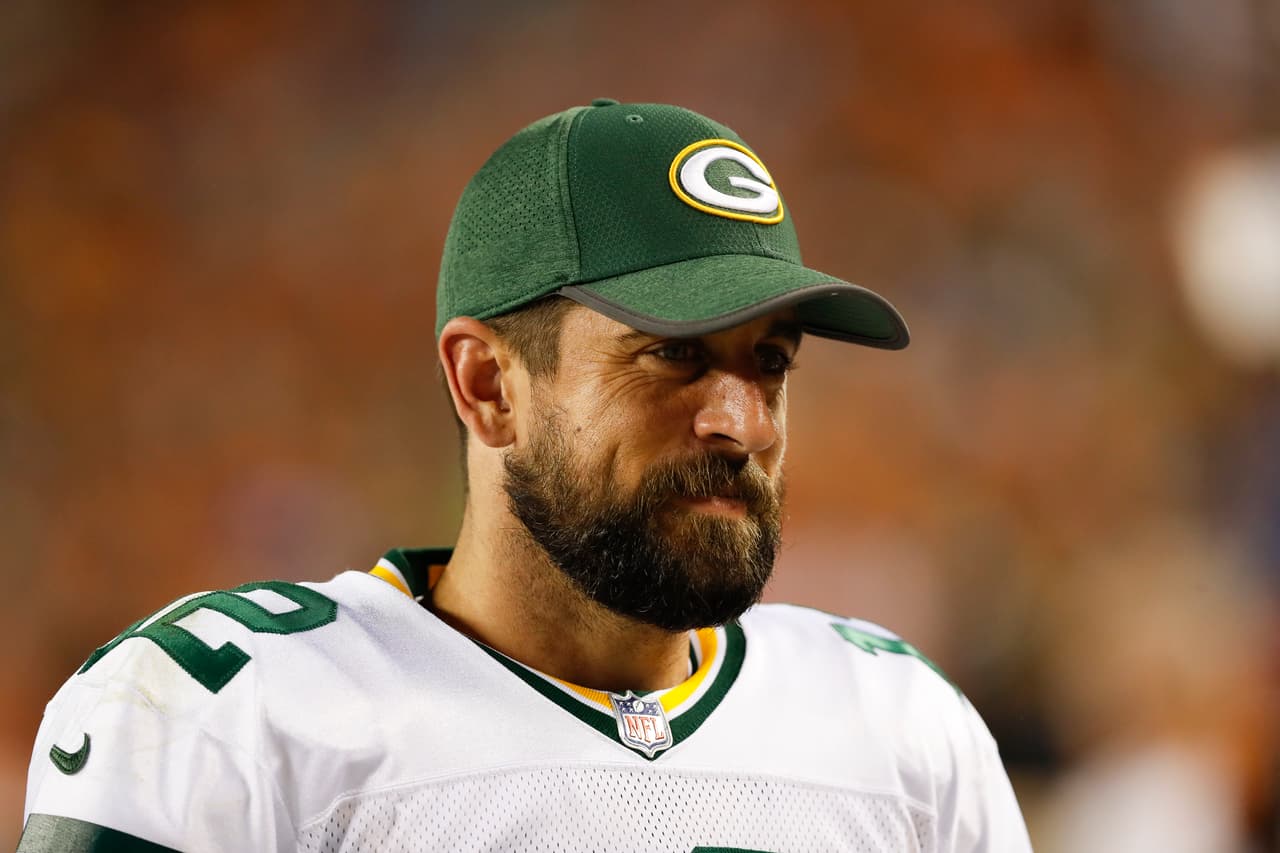 Green Bay Packers quarterback Aaron Rodgers (12) looks on during an NFL preseason football game against the Denver Broncos on Saturday, Aug. 26, 2017, in Denver. Denver won 20-17. (Aaron M. Sprecher via AP)
