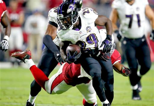 Los Cardinals salieron avantes del duelo plumífero del Lunes por la Noche ante Ravens 26-18. Checa las mejores tomas del partido.