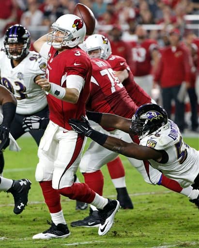 Los Cardinals salieron avantes del duelo plumífero del Lunes por la Noche ante Ravens 26-18. Checa las mejores tomas del partido.