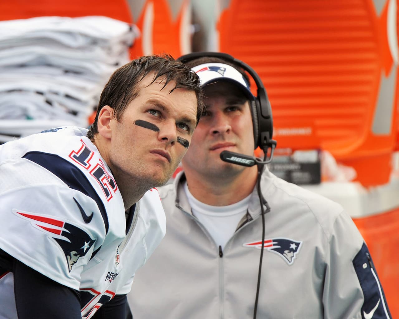 New England Patriots quarterback Tom Brady and offensive coordinator Josh McDaniels watch play from the bench against the Miami Dolphins Sunday, Jan. 3, 2016 at Miami Gardens, Fla. The Dolphins won 20 - 10 to end the NFL football regular season. (Al Messerschmidt via AP)
