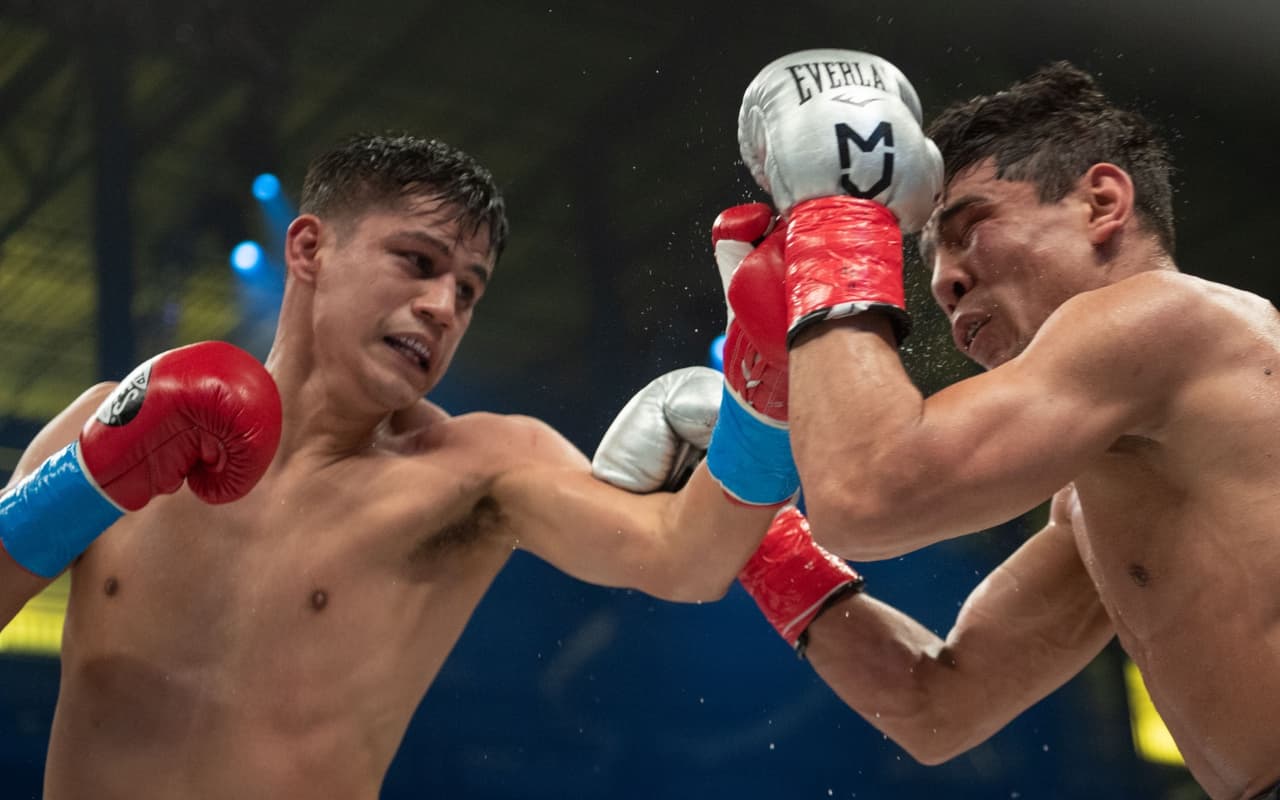 Murodjon Akhmadaliev sorprendió a Daniel Román al arrebatarle los cetros mundiales supergallo AMB Y FIB.