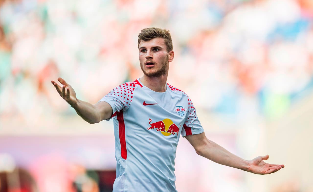 Leipzig's German forward Timo Werner gestures during the German first division Bundesliga football match between RB Leipzig and TSG Hoffenheim in Leipzig, eastern Germany on April 21, 2018. (Photo by ROBERT MICHAEL / AFP) / RESTRICTIONS: DURING MATCH TIME: DFL RULES TO LIMIT THE ONLINE USAGE TO 15 PICTURES PER MATCH AND FORBID IMAGE SEQUENCES TO SIMULATE VIDEO. == RESTRICTED TO EDITORIAL USE == FOR FURTHER QUERIES PLEASE CONTACT DFL DIRECTLY AT + 49 69 650050 / RESTRICTIONS: DURING MATCH TIME: DFL RULES TO LIMIT THE ONLINE USAGE TO 15 PICTURES PER MATCH AND FORBID IMAGE SEQUENCES TO SIMULATE VIDEO. == RESTRICTED TO EDITORIAL USE == FOR FURTHER QUERIES PLEASE CONTACT DFL DIRECTLY AT + 49 69 650050 (Photo credit should read ROBERT MICHAEL/AFP/Getty Images)