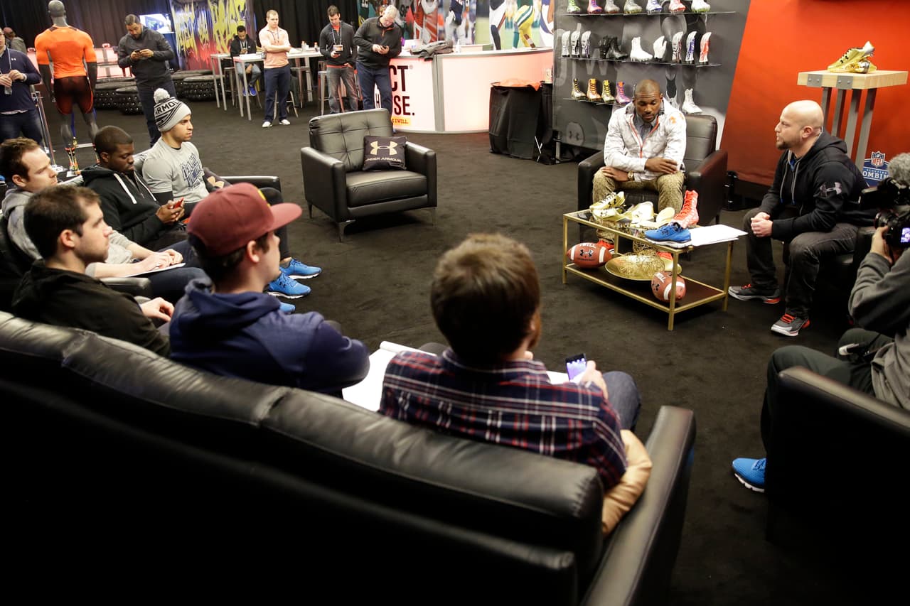 NFL player Patrick Peterson, left, and Josh Rattet, Vice President of Team Sports, Footware and Accessories for Under Armour talk with the media at the Under Armour SpeedForm MC Experience at the NFL Combine in Indianapolis, Wednesday, Feb. 18, 2015. (AJ Mast /AP Images for Under Armour)