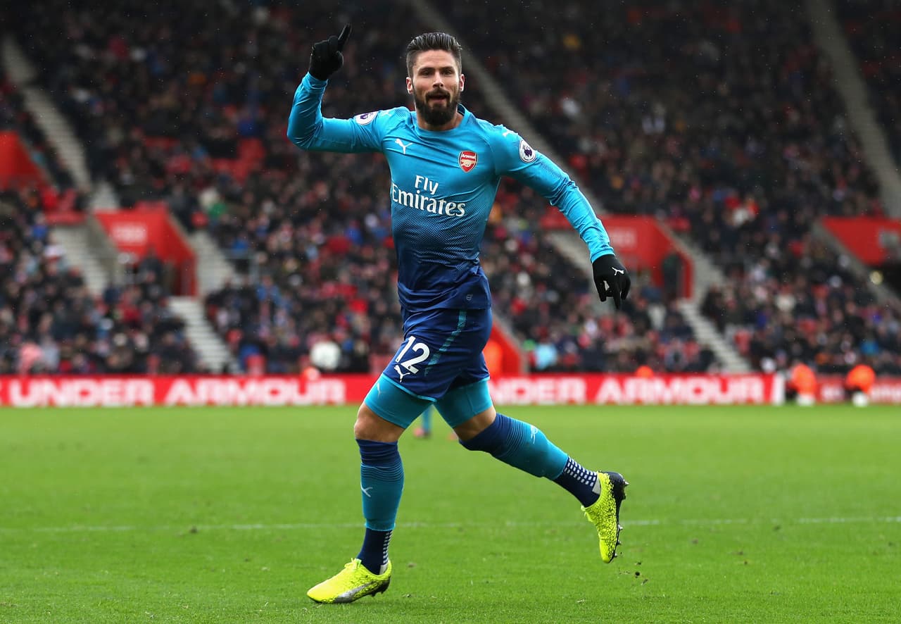 SOUTHAMPTON, ENGLAND - DECEMBER 10: Olivier Giroud of Arsenal celebrates scoring his side's first goal during the Premier League match between Southampton and Arsenal at St Mary's Stadium on December 9, 2017 in Southampton, England. (Photo by Catherine Ivill/Getty Images)