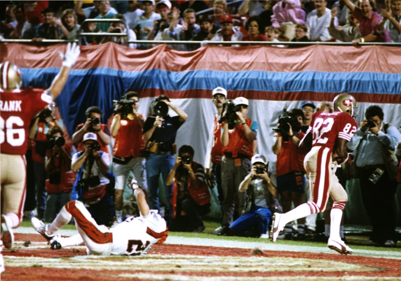 John Taylor con la recepción de 10 yardas que le dio el triunfo a los 49ers por pizarra de 20-16. Fue una serie ofensiva de 92 yardas que ilustre el concepto de Bill Walsh en los ochenta.