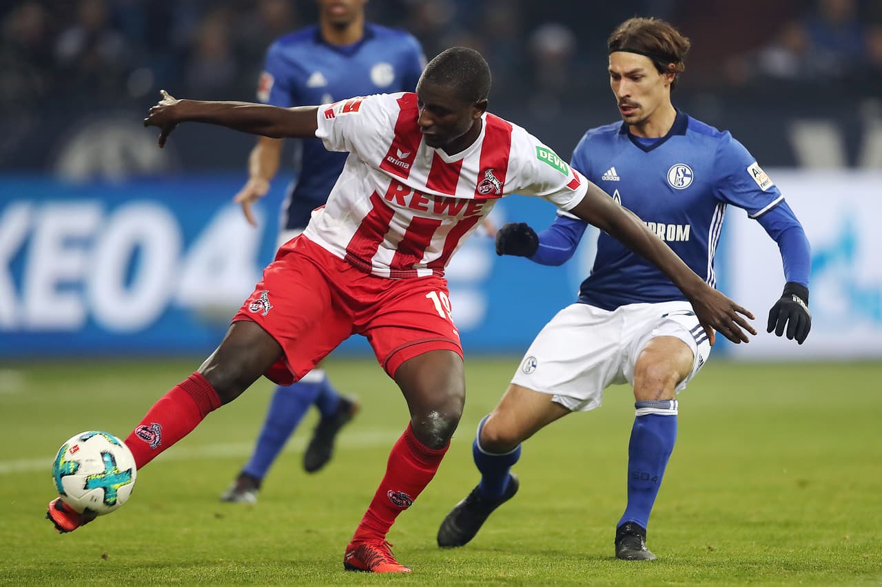 GELSENKIRCHEN, GERMANY - DECEMBER 02: Sehrou Guirassy of Koeln (L) is chased by Matija Nastasic of Schalke during the Bundesliga match between FC Schalke 04 and 1. FC Koeln at Veltins-Arena on December 2, 2017 in Gelsenkirchen, Germany. (Photo by Christof Koepsel/Bongarts/Getty Images)